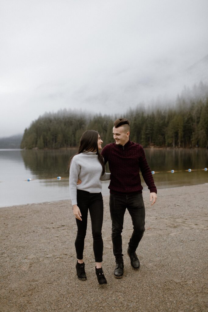 A couple at a beach engagement photo location in Greater Vancouver